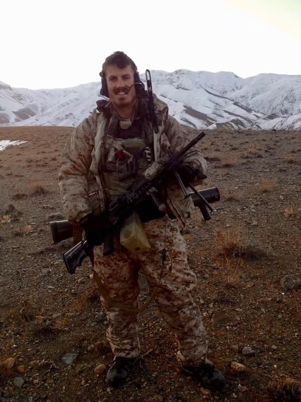 SpecOpsMagazine's tweet photo. Jonathan "MrBallen" Allen is the storyteller behind the popular "Strange, Dark and Mysterious" videos and the hit podcast that followed. Before the flannel and the campfire cadence, he was a U.S. Navy SEAL.

A Quincy, Massachusetts kid who dropped out of UMass Amherst after one semester before eventually returning and graduating with a philosophy degree in 2010, Allen enlisted right after college, and made it through one of the toughest pipelines in the military, graduating SEAL Qualification Class 291 in 2012. He served with SEAL Team Two from 2012 to 2017, deploying to Afghanistan in November 2013.

His service came with real cost. During a deployment on Easter Sunday 2014, his team took fire from Taliban fighters in a rooftop firefight in a small Afghan town, and in the chaos of their exit, ran into more enemy combatants. He was wounded by an enemy fragment grenade in the fighting, earning him the Purple Heart, alongside the Navy Commendation Medal with a Valor device.

After leaving the Navy, he co-founded Elite Meet, an organization helping veterans find employment, before launching his YouTube channel in 2020. Today he runs Ballen Studios and the MrBallen Foundation, which funds therapy, scholarships, and direct support for crime victims and their families, work he's said is shaped directly by his own firsthand understanding of trauma and loss.