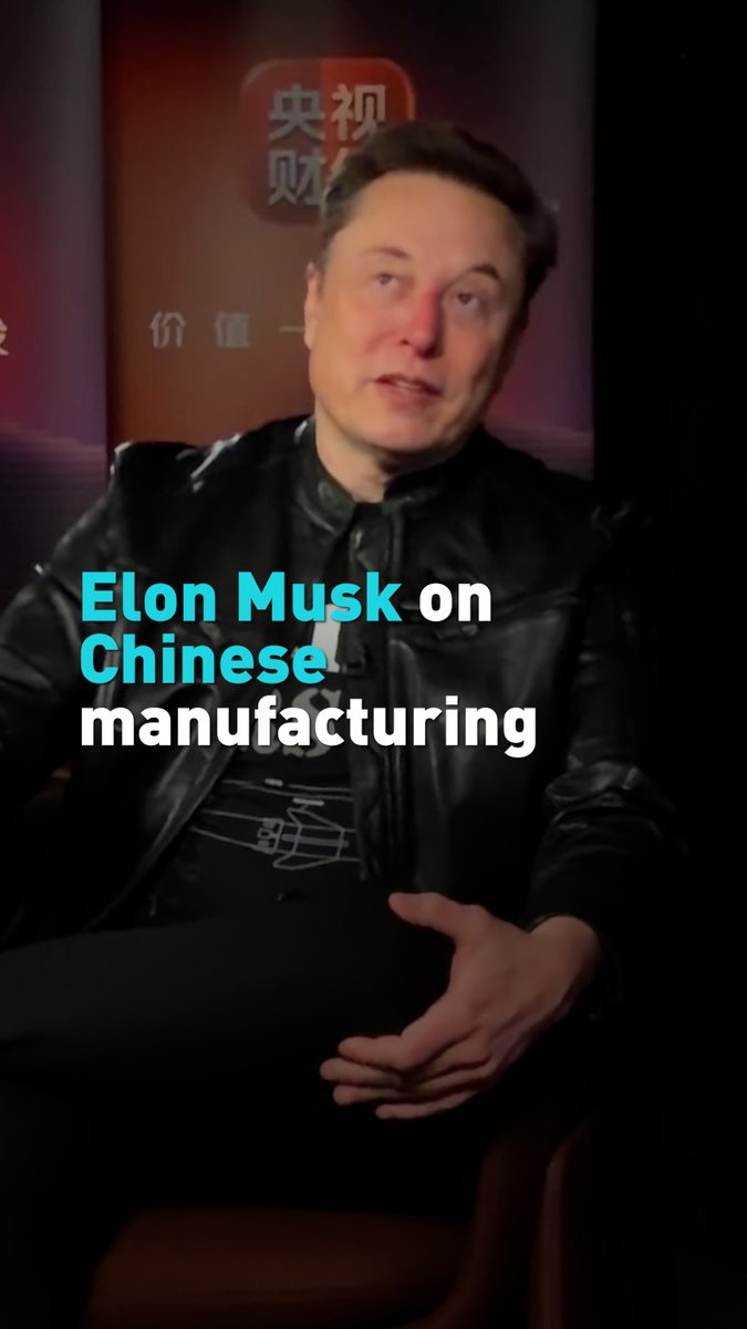 A vertical video still of Elon Musk being interviewed with Chinese text '央视财' (CCTV Finance) in the background, overlaid with the caption 'Elon Musk on Chinese manufacturing'.