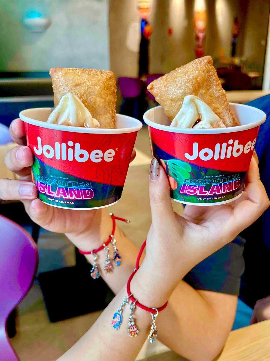 Jollibee's tweet photo. THE WAIT IS OVER! 😍🫶✨ The Jollibee x Forgotten Island Adventure Bundle is now available nationwide! 🇵🇭

Enjoy your jolly favorites plus the new, limited-edition Peach Mango Pie A La Mode and Friendship Charm Bracelet, available at Jollibee for a limited time until Oct. 31.

And yes, Forgotten Island is now showing in cinemas! 🌴🍿🎬✨ #ForgottenIslandPH