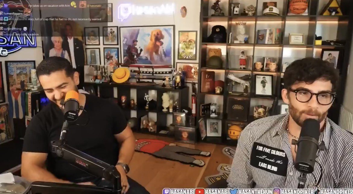 DSA_Watch's tweet photo. Abdul El-Sayed and Hasan Piker laugh while making 9/11 jokes

(Also notice the Twin Towers burning in the background) https://t.co/GfKsHAqjSz