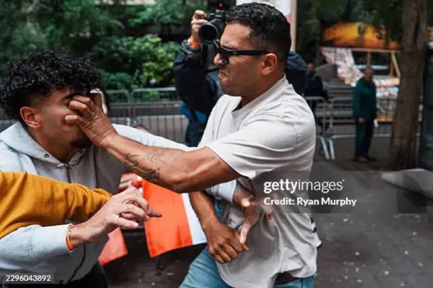amsafavi's tweet photo. NYC, 9/22: A picture is worth a thousand words! 
What the Pahlavi cult promises for Iran.
The thug was promptly arrested by NYPD. 
The crown &amp; the turban are the two sides of the same coin. 

@marthamaccallum @seanhannity @LaraLeaTrump @FoxNews @jaketapper 
#No2ShahNo2Mullahs https://t.co/pWcqpPoClZ