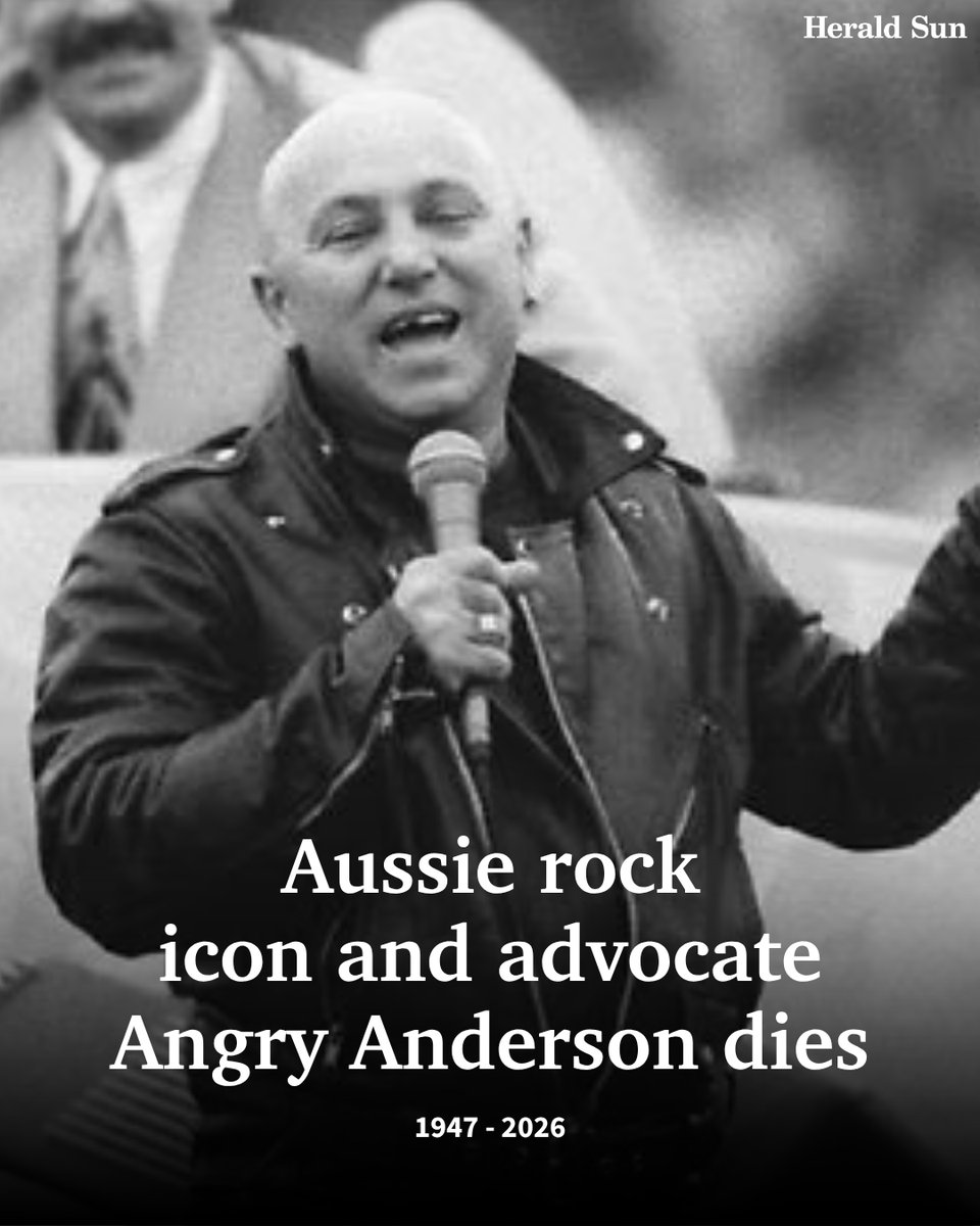 theheraldsun's tweet photo. #BREAKING: The man who reportedly headbutted amplifier stacks at Reading Festival and then topped charts with a Neighbours wedding ballad has died – Gary “Angry” Anderson AM was one of a kind > https://t.co/gsEkP4KKLf https://t.co/dy6GuzW2yB
