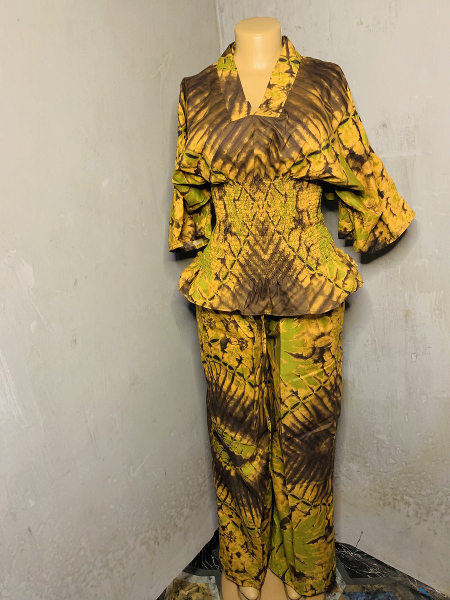 sophie_thread's tweet photo. Another day, another design to showcase. 

Made both long and short trousers using six yards of Ankara fabric.

I also did a little alteration to the top. The original was a bubu top, but I turned it into a shirred top, and I love how it came out. https://t.co/7U2Yc4CCQH