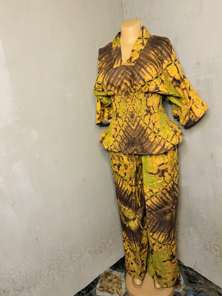 sophie_thread's tweet photo. Another day, another design to showcase. 

Made both long and short trousers using six yards of Ankara fabric.

I also did a little alteration to the top. The original was a bubu top, but I turned it into a shirred top, and I love how it came out. https://t.co/7U2Yc4CCQH