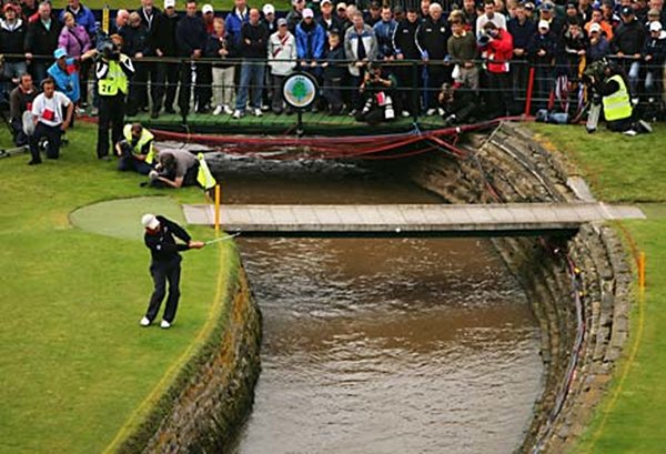 CarnoustieCad's tweet photo. The time Harrington pulled a Van de Velde.

2007, and he stood on the 18th tee with a one shot lead in the Open. He leaked his drive into the Barry Burn.

As he and his caddie walked up to the burn, Garcia was coming over the footbridge from the 17th, three shots to play and the Claret Jug still his to lose.

Garcia grinned at him and said hello.

Harrington never said a word back. He just stared through him.

He went on to put his second in the burn as well, and made a double bogey 6 on the last hole of the Open. Eight years after Van de Velde, same hole, same water.

The door was opened for Garcia. A par and he would be Champion Golfer of the Year.

He pulled his approach into the bunker, splashed out to 10 feet, and missed a very makeable putt.

A play off. Aggregate of 1, 16, 17 and 18.

Harrington hit a 7 iron to 10 feet on the 1st for birdie. Garcia made bogey out of a bunker. Two shots in one hole and it was effectively done.

On 16 Garcia's tee shot actually hit the flagstick and ran 20 feet away.

Harrington played the four holes in level par and became the first Irishman to win the Open since 1947.

Carnoustie has a habit of throwing up drama and theatre, you can lead for 71 holes and the 18th will remind you who's boss.

#Carnoustie #theOpen #Barryburn