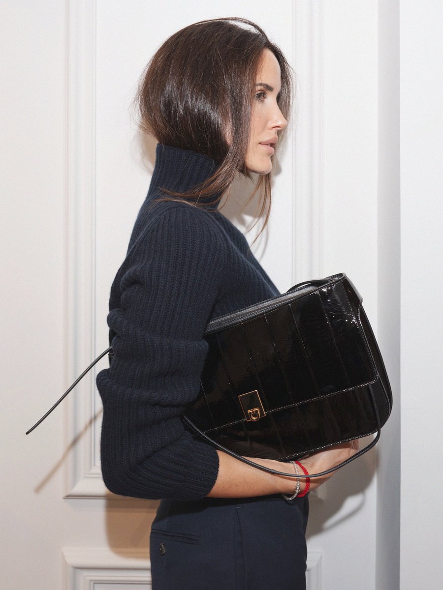 Ferragamo's tweet photo. Jihyo and Alex Rivière carrying the new Cara bag. https://t.co/BvRBqGFI5Y