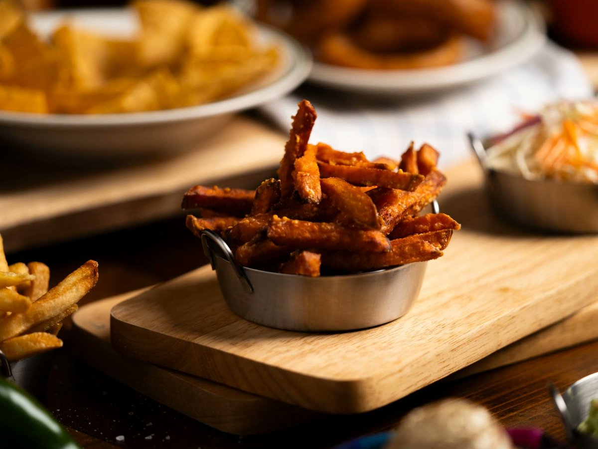 rodeogrillTH's tweet photo. Crispy, golden and full of flavour — our sweet potato fries are the perfect side for any Rodeo feast. https://t.co/FPzBXJwsdN