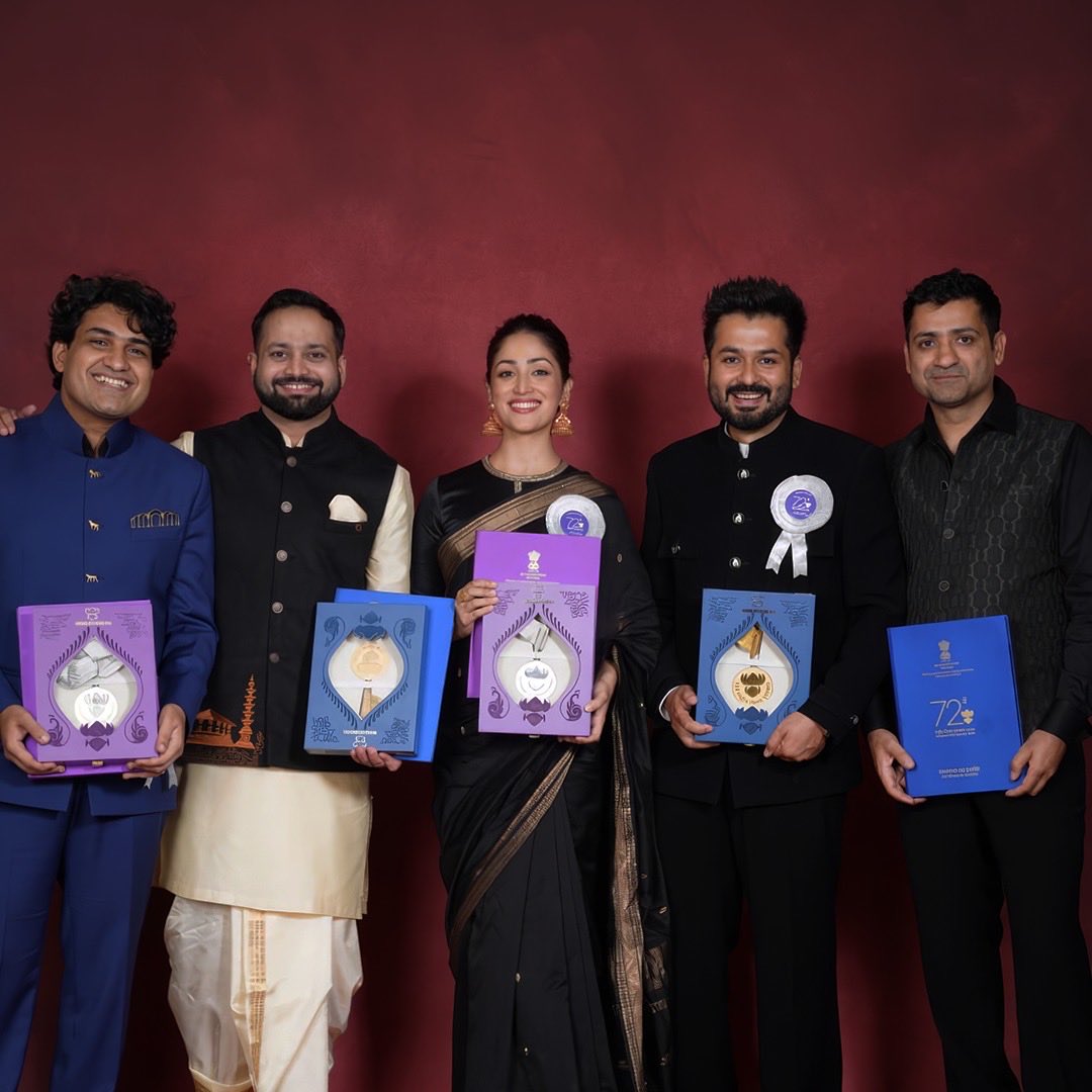 AdityaDharFilms's tweet photo. Some milestones leave you humbled, grateful and completely overwhelmed. ❤️
Article 370, the very first film from B62 Studios, receiving three National Awards is a truly extraordinary and unforgettable moment for all of us.
To share this beautiful and prestigious honour with my brother Lokesh Dhar, dearest Jyoti Deshpande, my beloved Yami Gautam Dhar, the musical star Shashwat, our super talented director Aditya Suhas Jambhale and the entire team is deeply special.
A heartfelt thank you to everyone who poured their passion, conviction and soul into this film. What began as a story we deeply believed in has become a moment we will cherish forever.
Our first release. Three National Awards. An incredibly proud B62 Studios moment. 🙏🏻❤️
But with an honour this great comes an even greater responsibility.
This is not where the journey ends. It is a reminder to dream bigger, tell stories with greater conviction and create Indian cinema that can travel far beyond our borders.
Our aspiration at B62 Studios will always be to take Indian stories, Indian cinema and India’s soft power to greater heights, to create films that entertain, inspire, resonate with audiences across the world and make our country proud.
This honour gives us even more reason to aim higher, work harder and believe bigger.
The journey has only just begun. 🇮🇳❤️