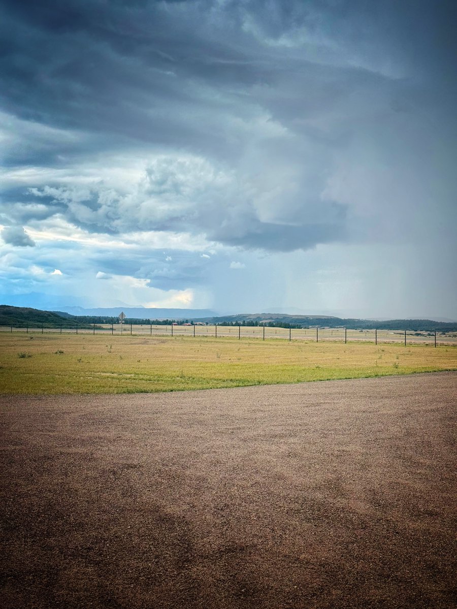 BorisFranzese's tweet photo. Yesterday at Hope’s riding lesson, a large front moved in. The photos made it look as though part of the screen hadn’t loaded: a giant, blurry wall of rain, plus a curious chicken and a cowgirl. Day 227 of 365 https://t.co/0iBVfdDQwF