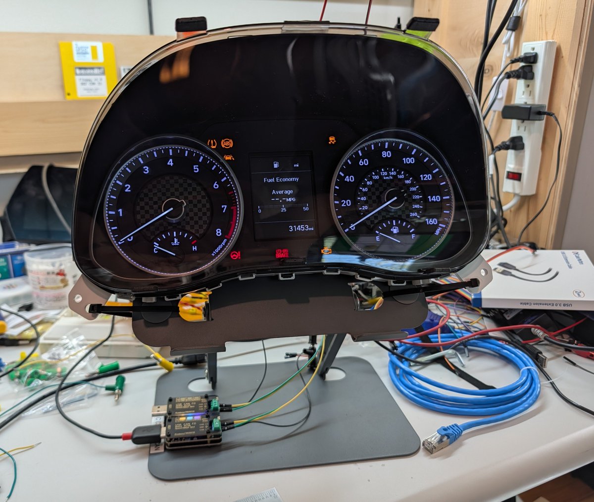 hakstuff's tweet photo. Instrument cluster setups ready for GrrCON's CHV! So far I've got a Ford, Nissan, and Hyundai cluster ready for hacking. Hoping to also set up an Audi cluster if I have time. https://t.co/eOWat3iD9w
