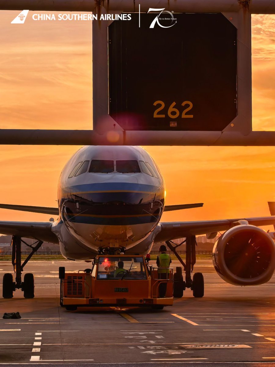 CSAIRGlobal's tweet photo. The tarmac is glowing orange under the sunset as a China Southern Airlines plane gets ready to take off. Have a lovely evening!✈️🌅
#CSAir #FlyWithCSAir https://t.co/ZmQiWBDtXV