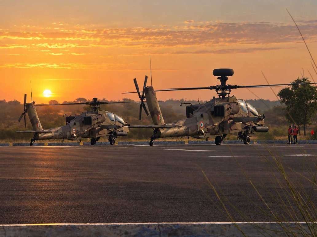 AHN24X7_X's tweet photo. EXERCISE YUDH ABHYAS 2026.

Indian Army AH-64E Apache attack helicopters take part in joint drills with Indian and US Army troops at the Mahajan Field Firing Range, Rajasthan, bringing a strong aerial combat element to integrated operational training.

#YudhAbhyas2026 #IndianArmy #Apache