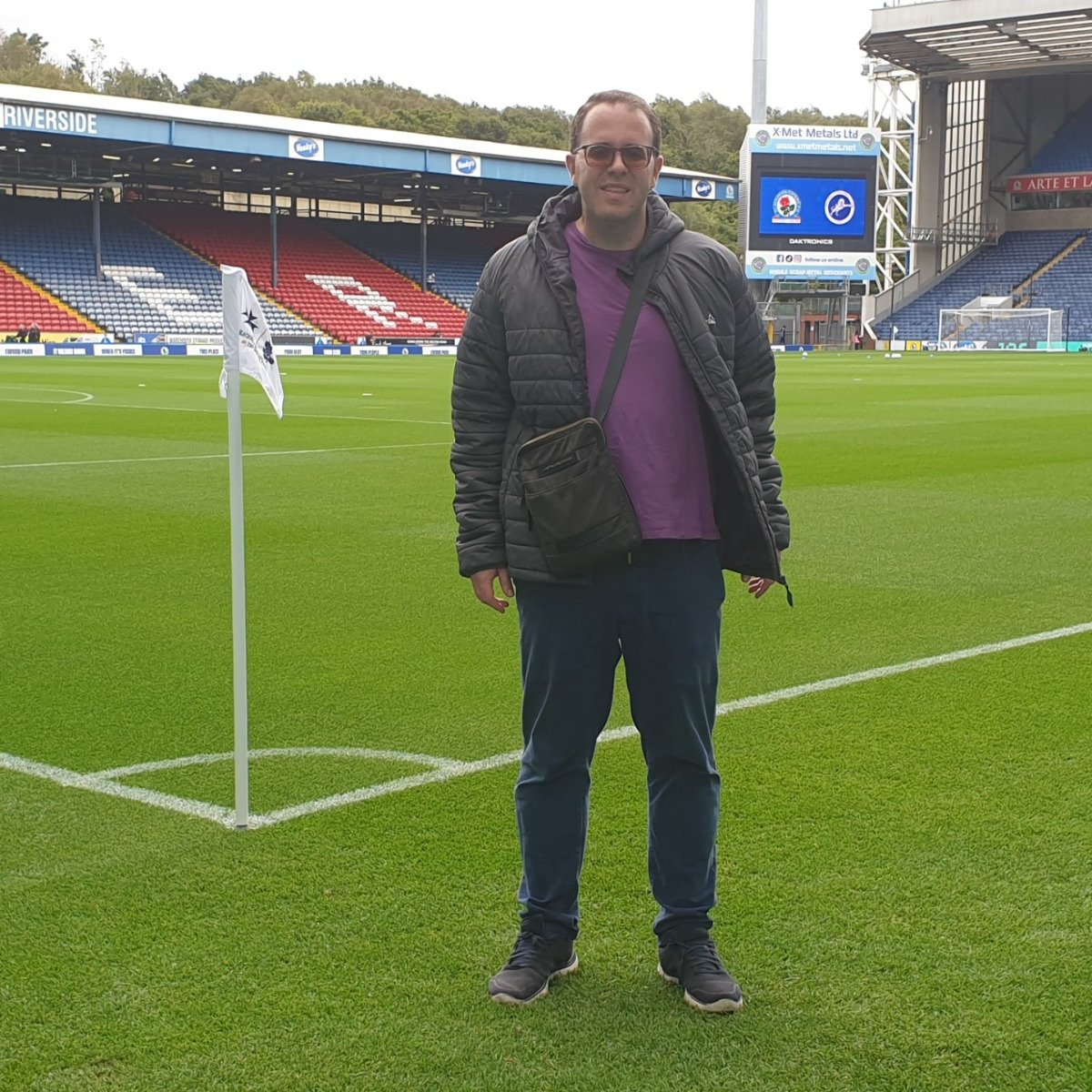 TheMillwallFans's tweet photo. Gianluca Sardi, who has been a huge Millwall fan since 2008, is always enthusiast in his research on football heritage and on the impact of sports on the life of communities. 

At the moment, with the precious support of fellow Lions fans Rob Woodford and Dave Sullivan, he is also working on a research project that examines the life of the legendary Dr. William Murray-Leslie, founder and first chairman of Millwall Rovers, that later became Millwall Football Club. Dr. William, who was also a Fellow of the Royal College of Surgeons of Edinburgh, an esteemed doctor (who had his practices both on the Isle of Dogs and in Belgravia), an excellent physician and a very reliable barrister-at-law, was also very active towards the support of community based initiatives in the area around the old London Docklands, especially as far as the younger generations were concerned.  

On Saturday 12 September, Gianluca Sardi (Professor of English Language at the Department of Political Science of the Università Internazionale delle Pubbliche Amministrazioni in the Republic of San Marino and Director of the Academy of Anglo-Italian Comparative Law and Bioethics in Manchester, UK) had the privilege to meet the Blackburn Rovers Football Club Official Andrew Thornhill at Ewood Park, before the starting of the game between Rovers and Millwall. 

It was an excellent opportunity to share the historical connections between the San Marino football and Blackburn. Firstly, Gianluca highlighted the career of Lorenzo Amoruso, who spent three years at Ewood Park from 2003 to 2006, before terminating his career at Cosmos in the Republic of San Marino in 2008. Even if his time in Lancashire was characterized by some bad injuries, the Blackburn fans have never forgotten his never-say-die attitude and his strong commitment on and off the pitch. 

Moreover, the duo remembered also Millie Chandarana, who played both in Blackburn and in San Marino with the San Marino Academy and is always a huge inspiration for so many young female footballers. 

Gianluca was invited on the pitch and was very enthusiast to hear the fascinating history of the Riverside Stand, which was built directly on the banks of the River Darwen.