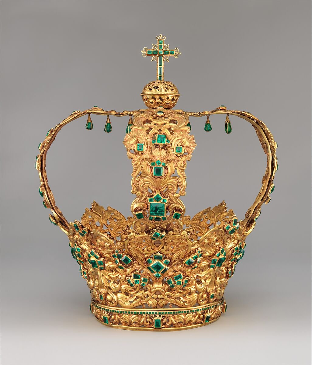 HerodotusWave's tweet photo. This crown contains 443 emeralds.

But it was never made for a living queen.

Known as the Crown of the Andes, it was created in Popayan, Colombia, to adorn a sacred statue of the Virgin Mary.

On important religious feast days, the statue was dressed in precious garments, given this crown and carried through the streets for public worship.

The crown weighs approximately 2.4 kilograms. Its untreated Colombian emeralds have a combined estimated weight of more than 846 carats. The largest is a 24-carat stone traditionally known as the "Atahualpa emerald."

But the crown was not created all at once.

The lower diadem was made around 1660. Its golden vines hold clusters of emeralds shaped like flowers, symbolising the Virgin's purity.

The arches were added about a century later, around 1770. They rise towards an orb and cross representing Christ's dominion over the world.

Further examination by the Metropolitan Museum revealed something even more interesting.

The crown was probably assembled in the nineteenth century from parts of at least three older objects. The cross may originally have been a separate pectoral cross, and differences in the gold settings show that the emeralds were attached at different moments in its history.

What appears to be one perfectly planned masterpiece is actually the work of several generations.

People donated precious objects because they wanted to honour the Virgin, ask for her help or give thanks for prayers they believed had been answered.

In 1914, Pope Pius X permitted the crown to be sold. By 1936, it had reached the United States.

It was displayed at places as unexpected as General Motors in Detroit and Macy’s in Manhattan. At a 1937 dinner, it was advertised as "the world’s most expensive centerpiece."

By the time it reached the Metropolitan Museum, centuries of use, alterations and handling had left the gold badly cracked. Its arches were bending, and conservators feared the entire crown could collapse.

Looking at it now, I do not see a single jeweller's finished creation.

I see a crown that kept changing because every generation wanted to leave something of its own behind.

One group made the diadem.

Another added the arches.

Others added emeralds, repairs and new meanings.

The crown’s beauty did not come from remaining untouched.

It came from becoming a place where centuries of human faith accumulated.

Photo: The Metropolitan Museum of Art, New York. Public Domain.
Object no. 2015.437.
