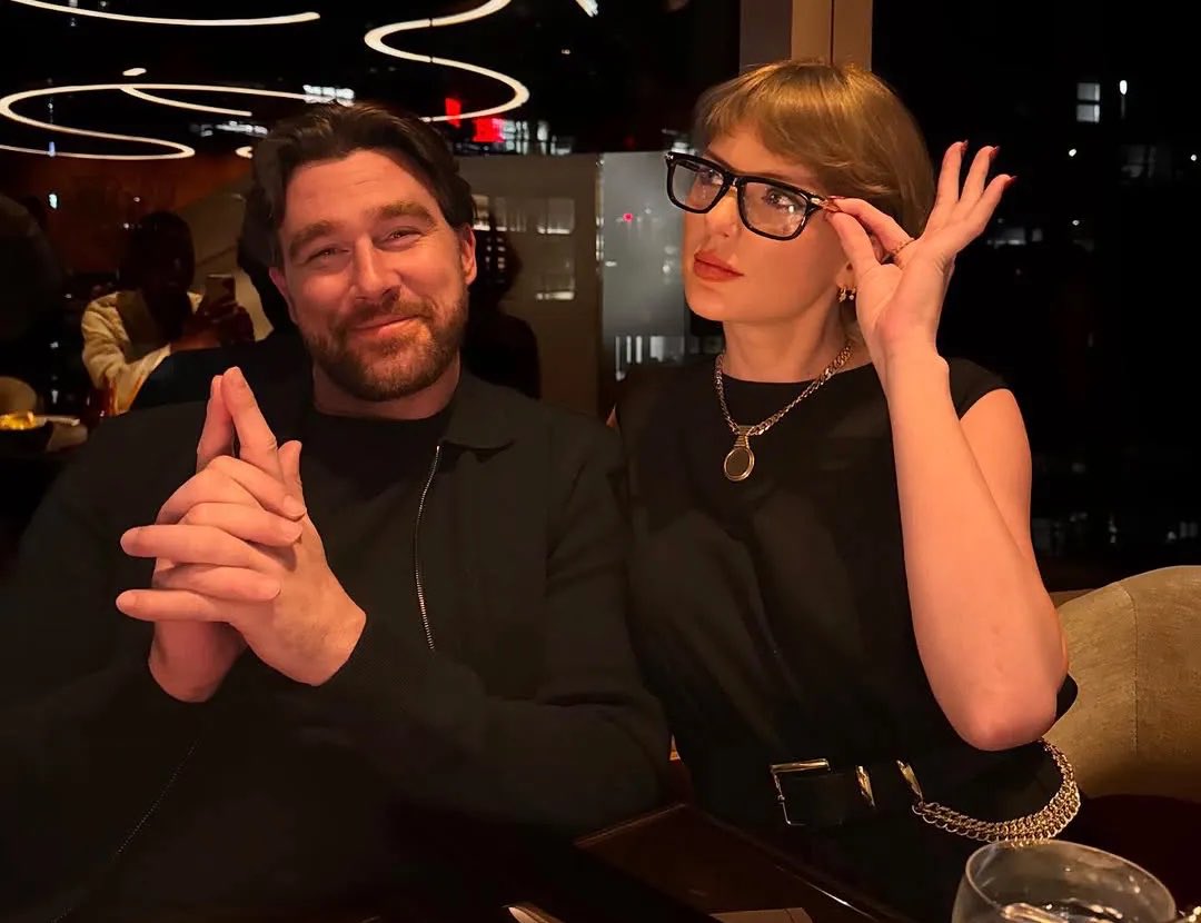 TSUpdating's tweet photo. Travis Kelce reacts to Taylor Swift’s viral “That’s my husband” moment at the Chiefs game on the latest episode of ‘New Heights’:

“Proud wife baby… Gotta make my girl proud!” https://t.co/5ixFXRcHVQ