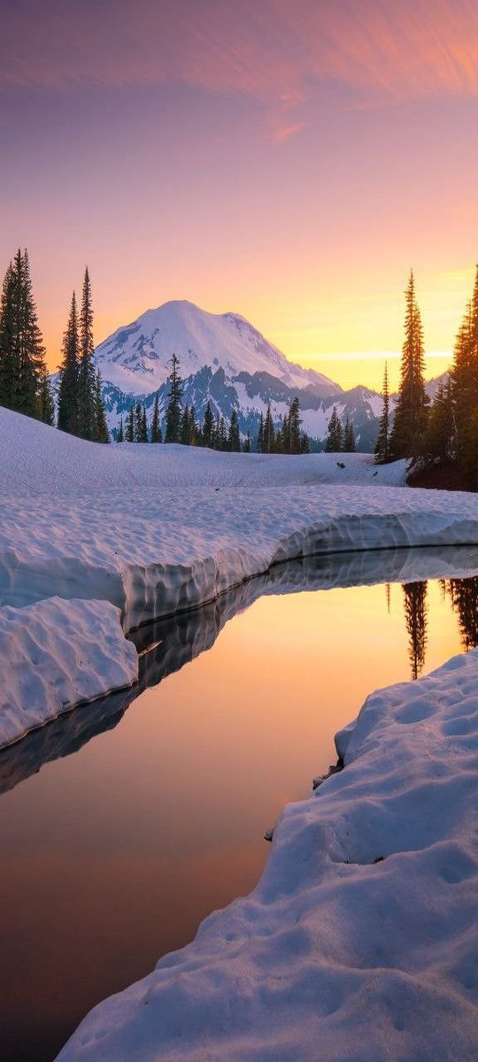 DesertAndPeaks's tweet photo. Mirror of the heavens. 🏔️💜
Snow peak glowing under a pink-orange sunset.
Still water holding the sky.
Silence, snow, and pure magic.
Where winter dreams come true. https://t.co/yINnqhYEI4