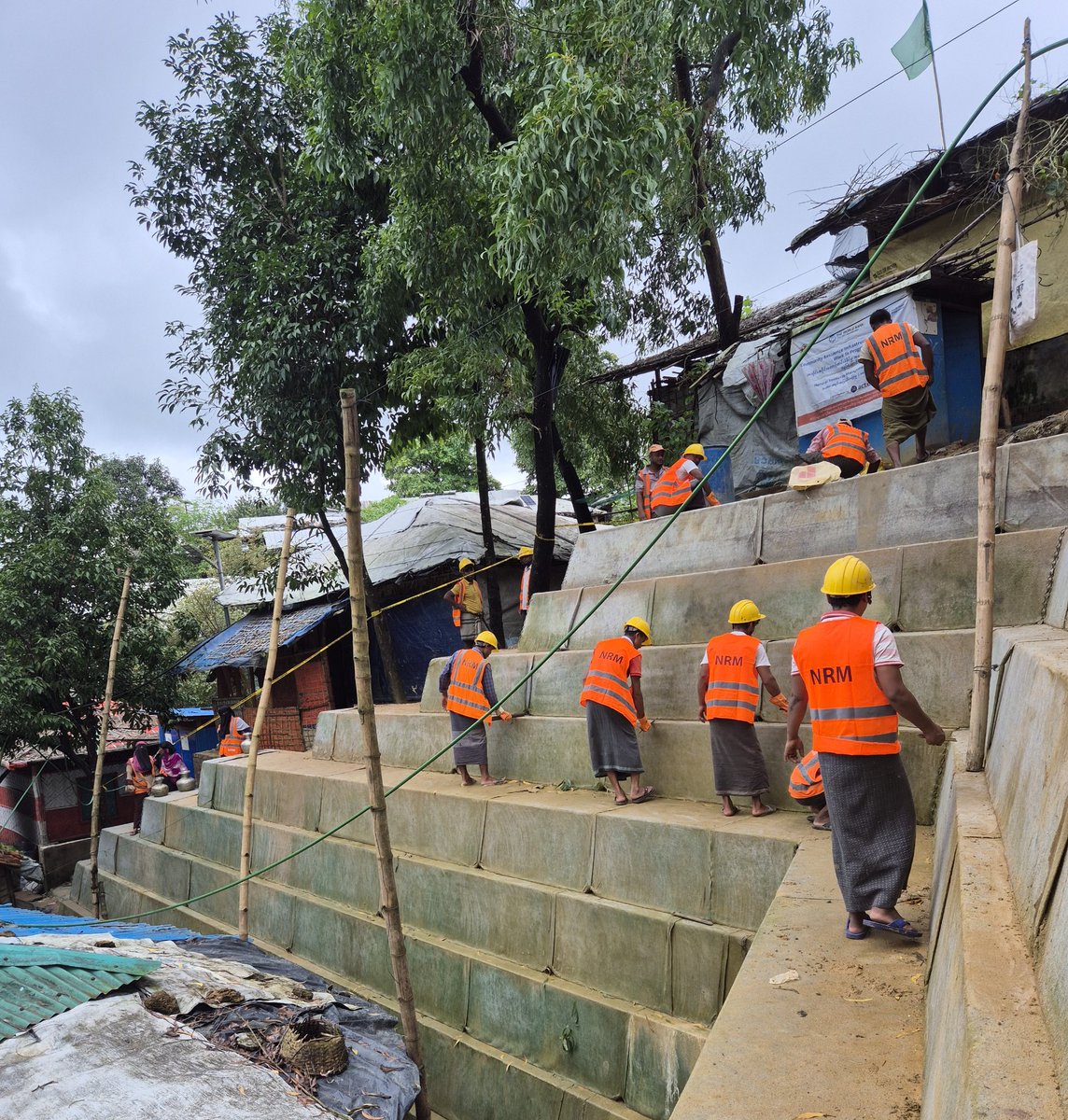 ActedBangladesh's tweet photo. Building resilience where it matters most.
With the support of WFP, Acted Bangladesh is implementing community resilience infrastructure activities in the Cox’s Bazar camps
#ActedBangladesh #WFP #RohingyaResponse #DRR #CoxsBazar #CommunityResilience #SlopeStabilization #NbS https://t.co/JgK91Jraa1