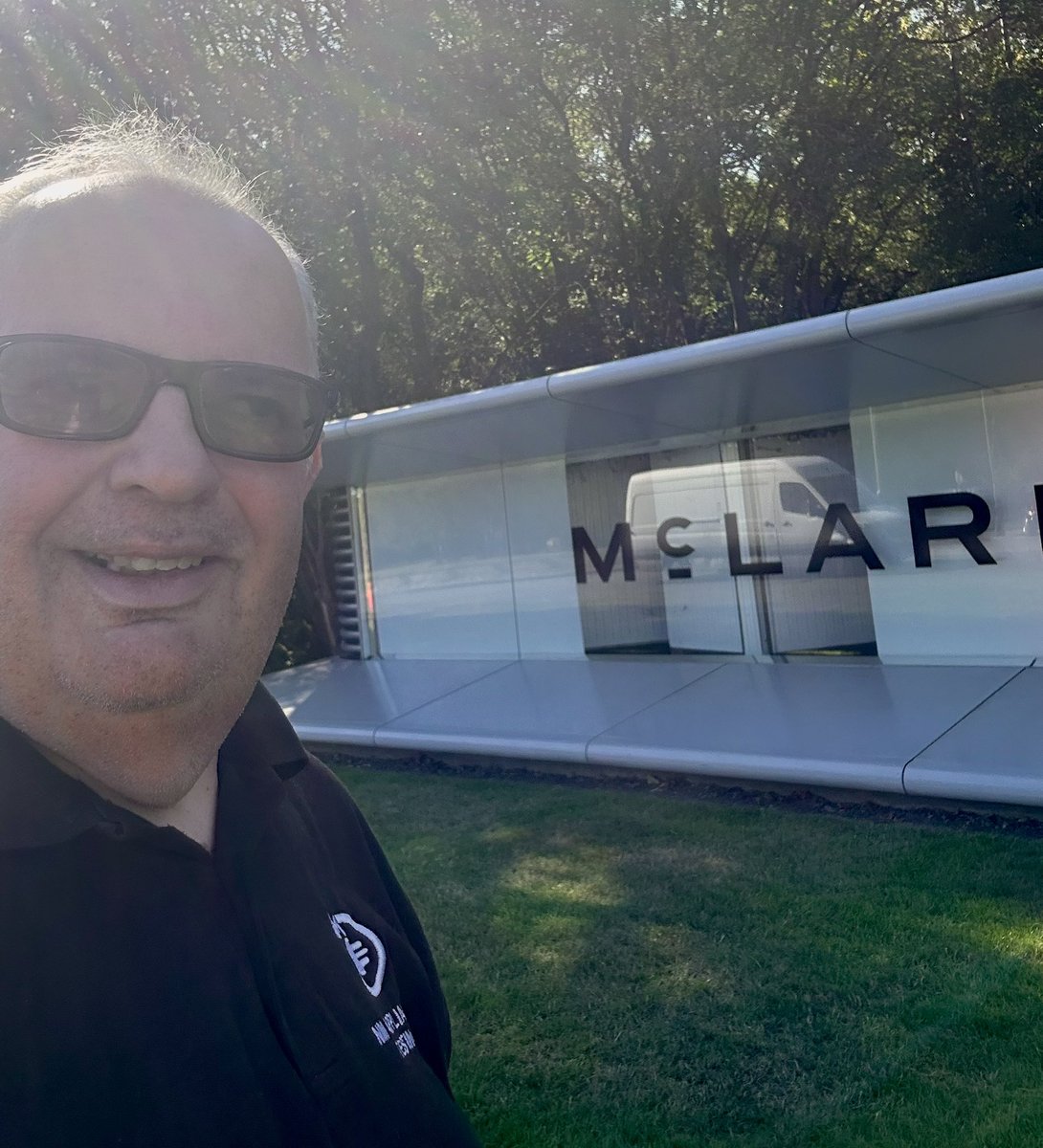 NMPATTesting's tweet photo. Working in Woking today, so I called by the McLaren Technology Centre to see the new logo. This is the sign that is lit up in Papaya whenever the team win. 
The new logo takes its influence from the original McLaren family garage back in New Zealand, so there is a heritage story. https://t.co/8Y0tMVFzBK