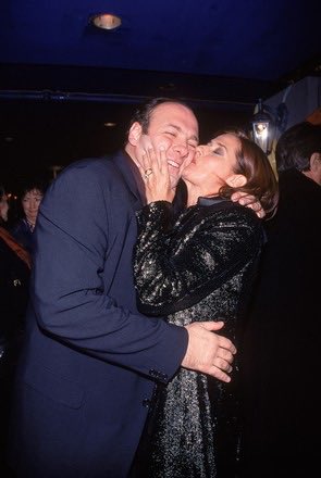 MobstersDaily's tweet photo. For years, James Gandolfini and Lorraine Bracco shared a private romance that existed almost entirely away from the cameras. According to Bracco, their relationship began quietly during the early years of The Sopranos and developed into something far deeper than either of them expected. They deliberately kept it away from the press and from the enormous attention surrounding the series, allowing the relationship to remain one of the few parts of their lives that belonged entirely to them.

Bracco described Gandolfini as intensely affectionate and completely different in private from the troubled man audiences knew as Tony Soprano. Their relationship was passionate but complicated, with periods when they would pull away from one another before eventually finding their way back. On set they remained professional, particularly during the famously intimate therapy scenes between Tony and Dr. Melfi, while almost nobody watching realized how much history supposedly existed between the two actors once the cameras stopped rolling.

Gandolfini’s death in 2013 meant that much of their story remained untold, and Bracco kept that part of their relationship private for years afterward. Looking back at photographs of them together now gives those moments an entirely different meaning. Behind one of television’s most fascinating onscreen relationships was supposedly another love story altogether, one that existed quietly for years and ended long before either of them could ever tell the world where it might have gone.