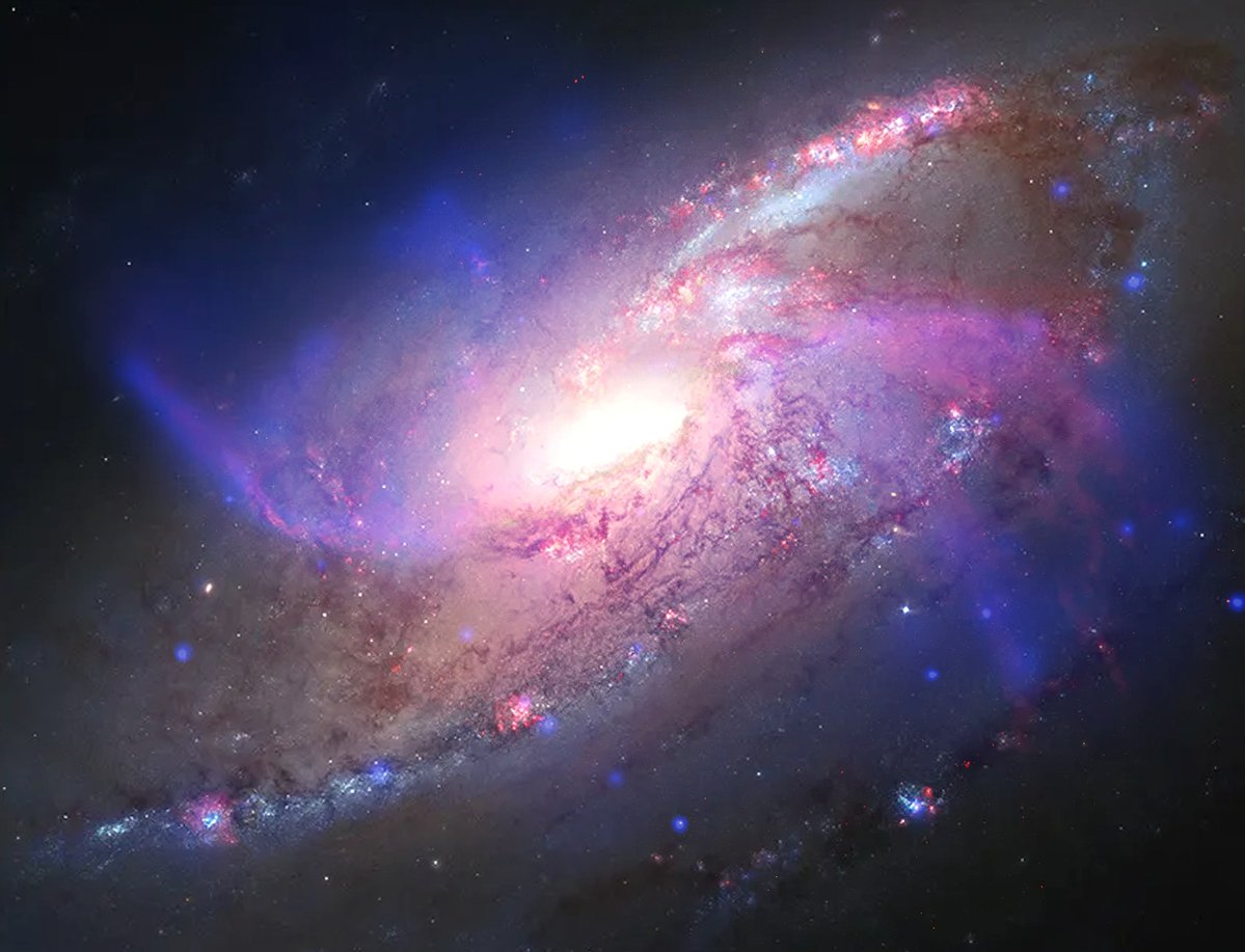 NASA's tweet photo. This galaxy is a little extra.

Meet Messier 106, a spiral galaxy with an extra set of arms. These two additional arms are made of gas heated up by jets from the galaxy’s central black hole. The jets’ superheated shockwaves are depicted in royal blue by @chandraxray. https://t.co/421Lzs0r0c