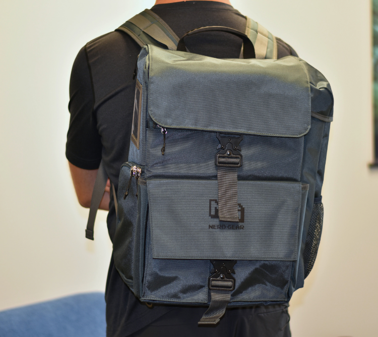 nerdgeargaming's tweet photo. This is what it actually looks like on your back. 🎒

One of our prototypes, out in the wild. Not a mockup, not a render, the real thing.

(Note: the security cover isn't on, just showing the bag itself for now.)

We'll be sharing a new look at it each week as we get closer to launch, angles, details, real use, all of it.

Waitlist's still open if you want to see it before anyone else. Link in bio, and below!

https://t.co/t0mYIT0RpE 

#TCG #TabletopGaming #stoneforge #mtg #gaminggear