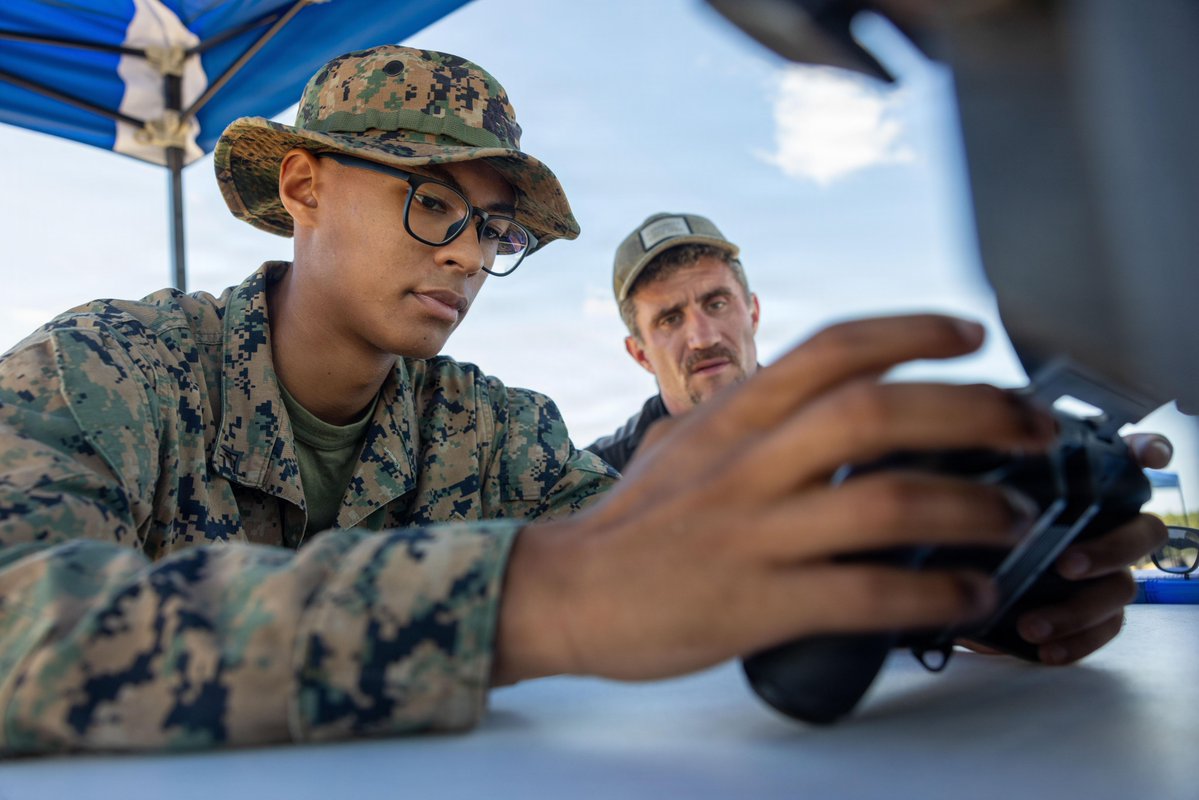 U.S. Marine Corps Lance Cpl. Caleb Rathbun, a machine gun team leader with 1st Battalion, 2nd Marine Regiment, 2nd Marine Division, learns to operate a Skydio X2D drone during a small, unmanned aircraft systems training at Marine Corps Base Camp Lejeune, North Carolina, Sept. 15, 2026. The Skydio X2D is a compact quadcopter drone used to conduct short range reconnaissance with autonomous flight and digital zoom capabilities, as well as 3D environment scanning. Rathbun is a native of Colorado. (U.S. Marine Corps photo by Cpl. Salvador Flores Perez)