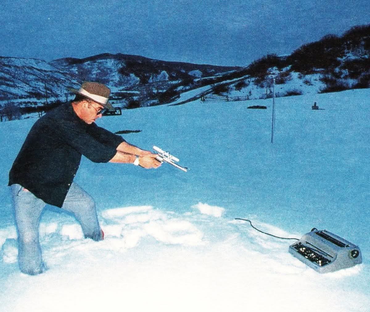 BillPourquoimec's tweet photo. Hunter S. Thompson aims at his IBM Selectric typewriter, Woody Creek, 1989 https://t.co/tMKLITnSR1