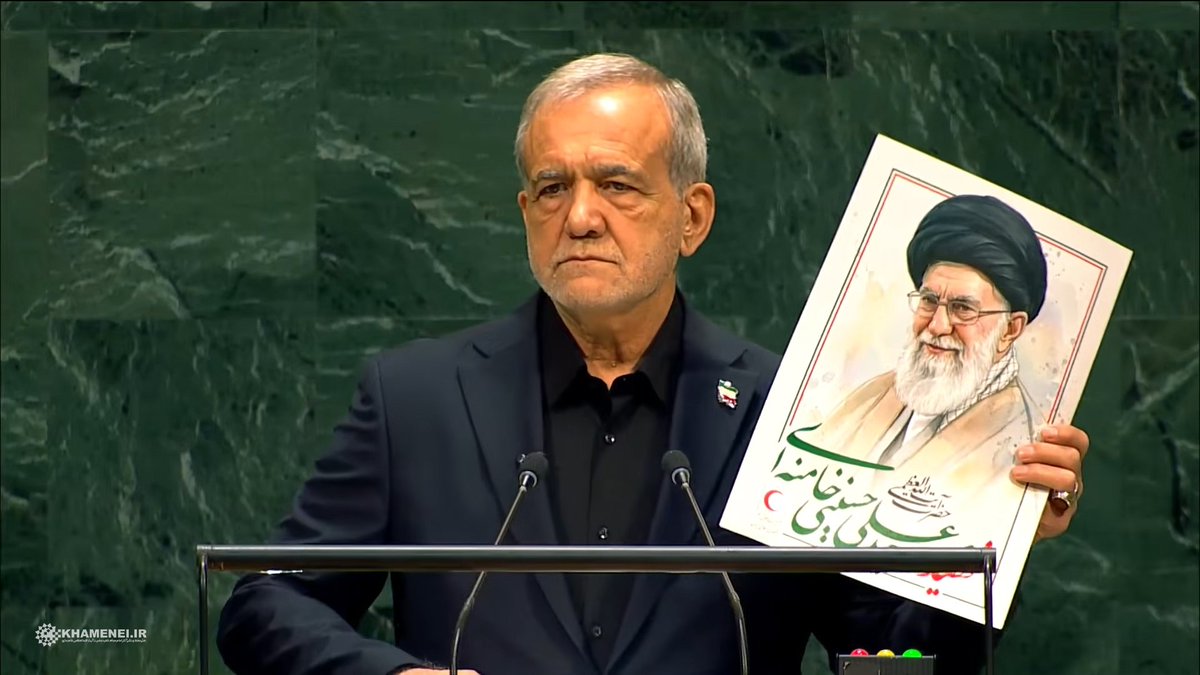 Khamenei_m's tweet photo. Dr. Pezeshkian, the President of the Islamic Republic of Iran, holding a picture of the martyred Leader of the Islamic Revolution at the #UNGA, Sept. 23, 2026 https://t.co/lV4VsS48y1
