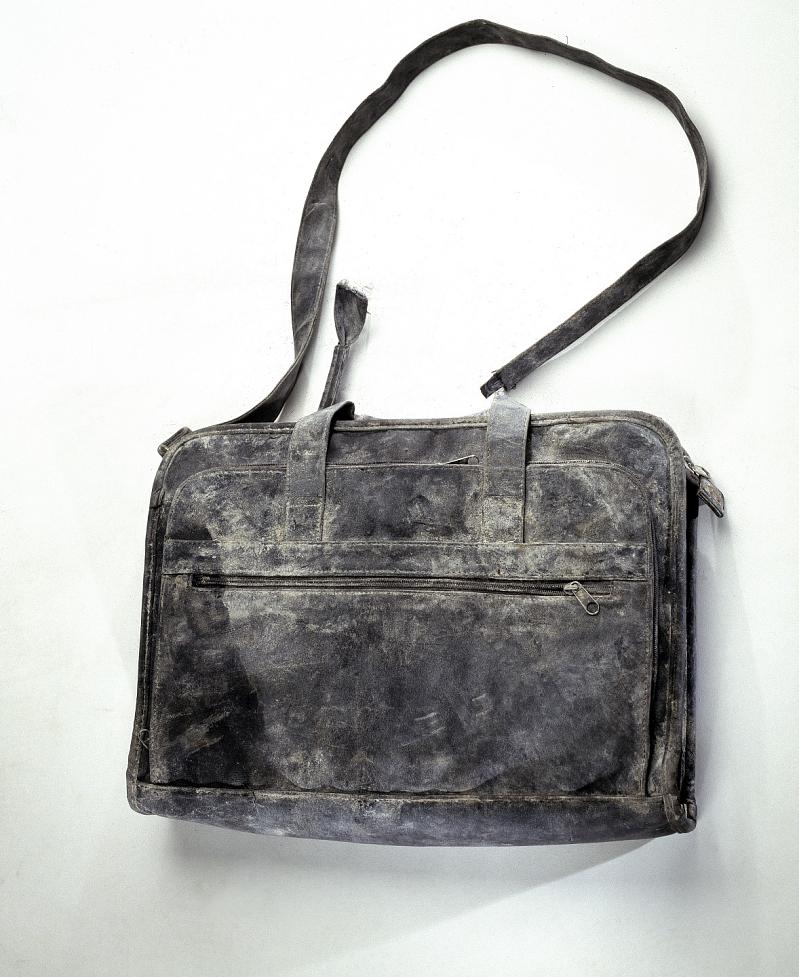 TheOlChippy's tweet photo. Lisa Lefler left this briefcase behind on the 103rd floor of the South Tower when she evacuated on 9/11.

Two days later, rescue worker Boyd Harden found it in the wreckage near Church and Liberty Streets. Her résumé was still inside, allowing him to track her down and return it.

Lisa survived.

The battered briefcase is now preserved by the Smithsonian.