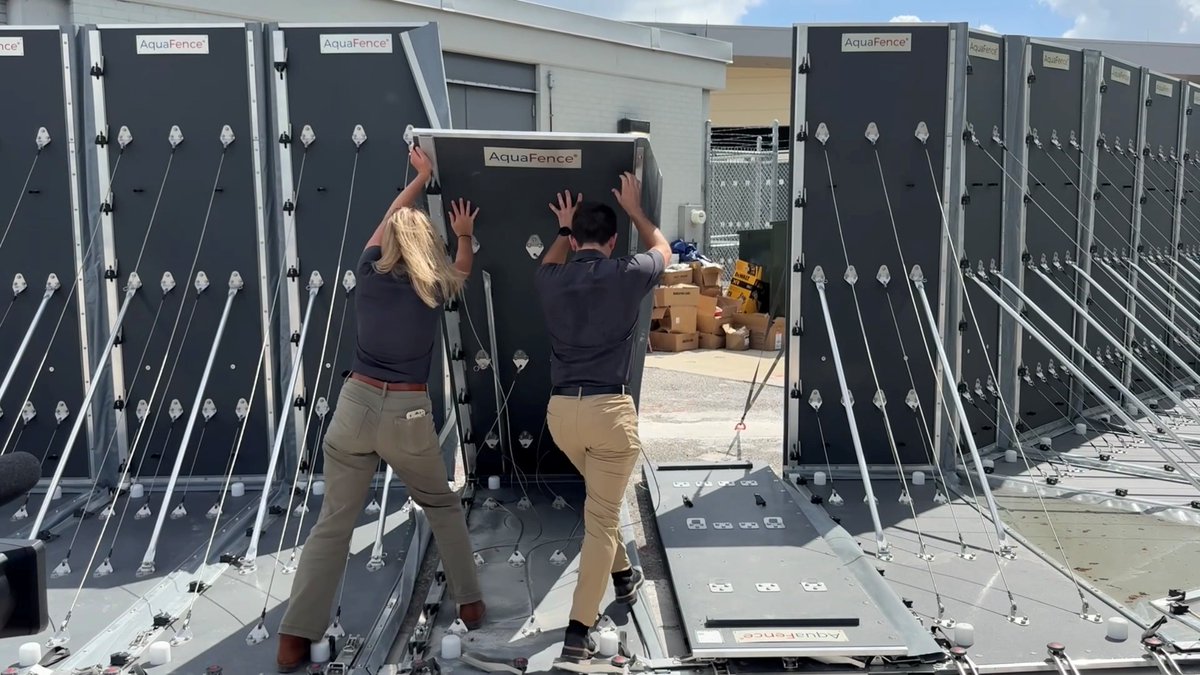 FlyTPA's tweet photo. PREPPING FOR THE FUTURE 🫡 Say hello to our new AquaFence, a temporary 9-foot barrier designed to shield TPA from storms. This new system was recently built to protect two electrical vault buildings should a hurricane threaten Tampa Bay. ⛈️

DETAILS: https://t.co/u5ItGGbGs3 https://t.co/eosbkfIyME