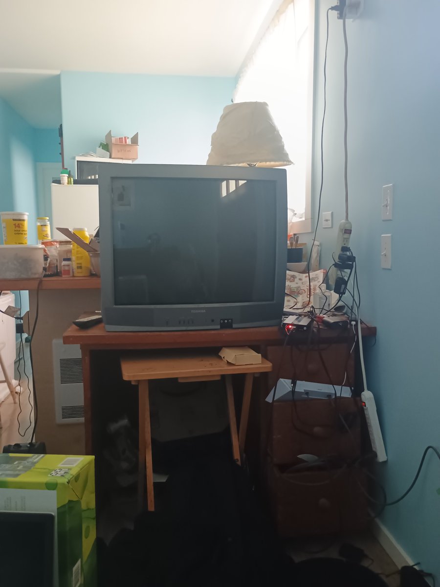 smackthat9876's tweet photo. Yes, this is how I watch my TV most of the time, so the government man cannot steal the diamonds from my body (audio of the converter goes to FM station in my headphones 🎧). https://t.co/vgLZc09kO3