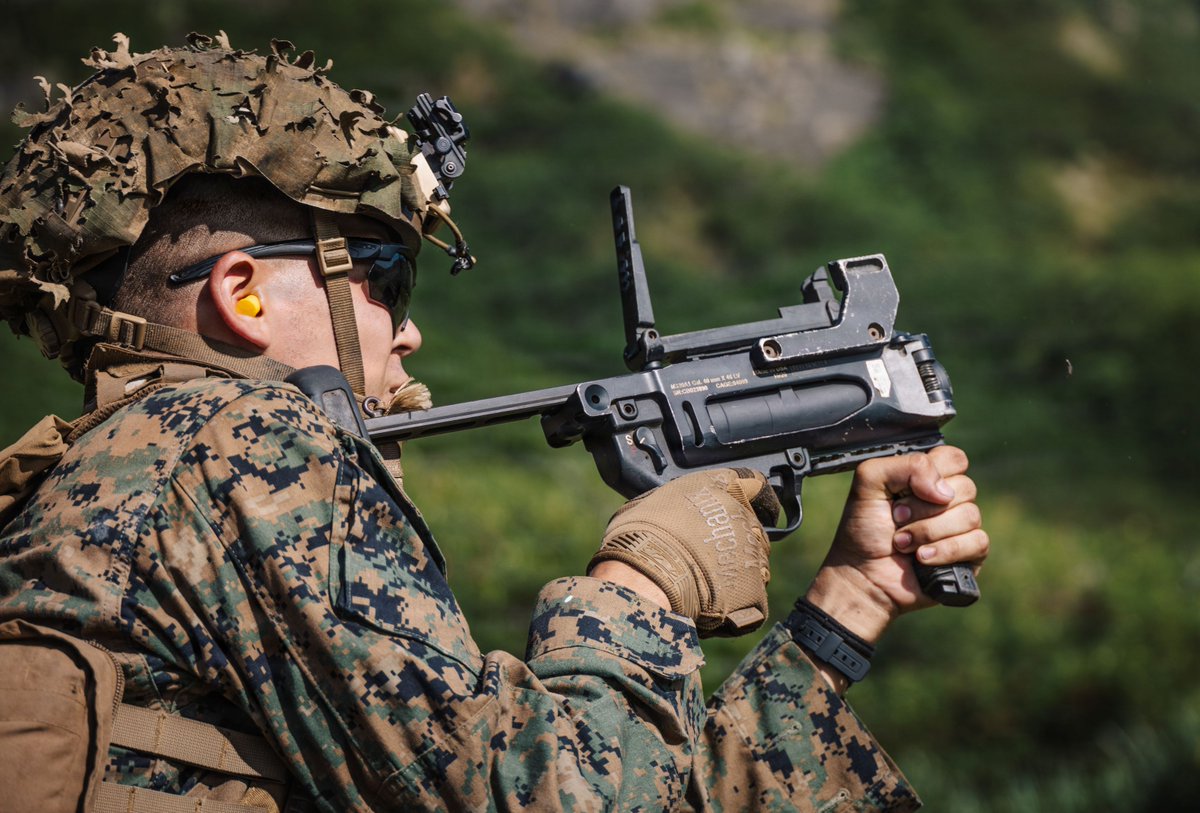 DeptofWar's tweet photo. Marines enhance their combat readiness and strategic decision-making skills during small-unit live-fire drills at Marine Corps Base Hawaii. https://t.co/nPg4MfJuHb