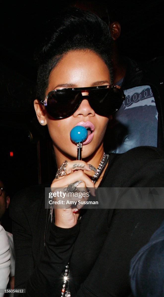 nae__paris's tweet photo. Rihanna with her Sugar Factory Lollipop (2009) https://t.co/GQEj1uiOJx