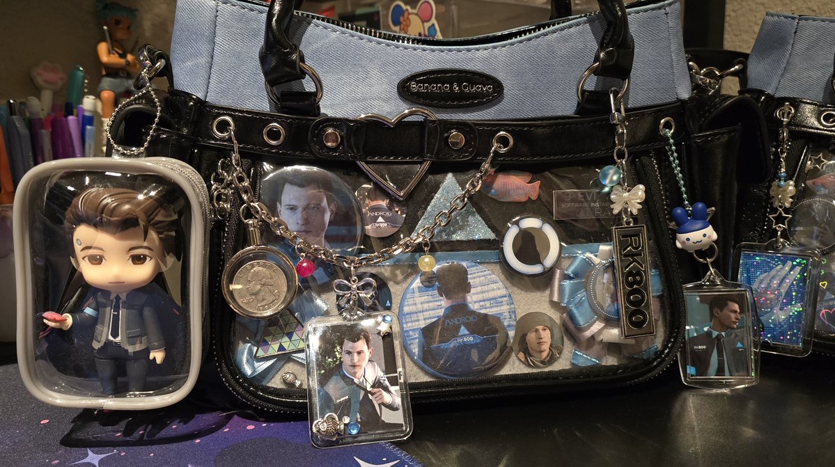 _pixelclaire's tweet photo. my sister and i made connor ita bags during her visit bc we've been really into #dbh again. i think they turned out so cute 🩵 https://t.co/s4QXl8M7ug
