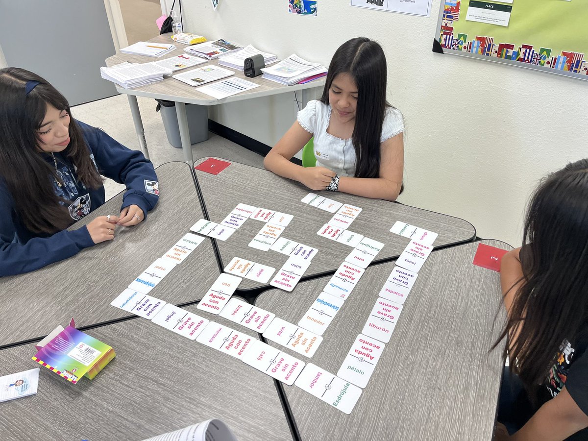 V_GarciaTAGinPG's tweet photo. Spanish class blends rigor with fun! Students strengthened their understanding of Spanish tildes through an engaging domino game. It’s rewarding to see learning and excitement come together! Vamos!🇪🇸 @DrReyC @TAGinPG #Region4SayNoMore @MJJackson1906 @duallanguage @AP_Pegues https://t.co/g6ybBDvNhb