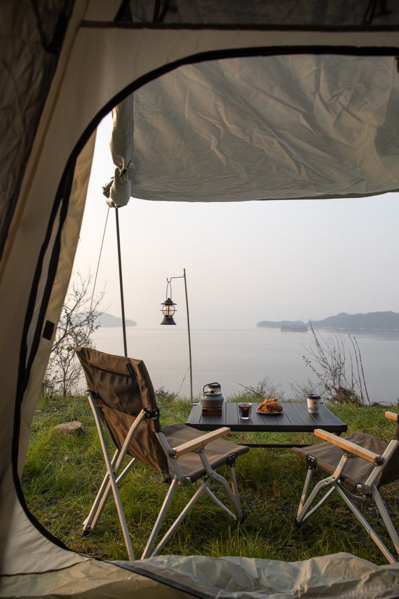NurilmiAMa's tweet photo. Woke up to birds chirping, fresh air, and my coffee next to the tent—this quiet morning at the campsite is exactly what I needed to reset https://t.co/0lIQkq2UZo