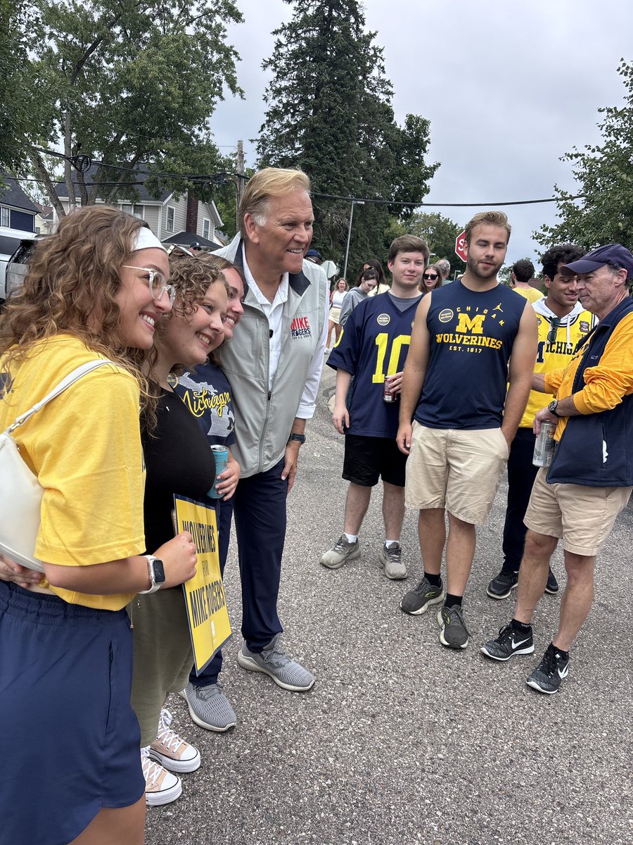 wideofthepost's tweet photo. here’s the student attacking @AbdulElSayed at this town hall, standing with @MikeRogersForMI at a college republicans tailgate for his campaign, 10 days ago, confirmed by his glasses https://t.co/FkWoJnbSuM