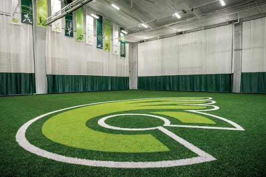 CoachKBurke3's tweet photo. Having an indoor turf facility is such a phenomenal thing.  Without it, not sure how much we could have accomplished yesterday when thunderstorms hit during practice.  With it, we were able to move forward and get things done. Go Quakers!

@DubC_Football https://t.co/0liTaP70eK