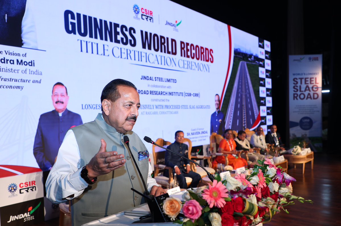 DrJitendraSingh's tweet photo. Addressed the ceremony to hand over the "Guinness World Record Certificate" jointly to Central Road Research Institute (#CSIR-CRRI), New Delhi and Jindal Steel Limited.

Takeaways:
"Steel Slag Road Technology can substantially extend the maintenance cycle, with maintenance of roads required only after about 15 years in suitable applications, making it a breakthrough with implications not only for road engineering but also for the overall infrastructure economy. Most importantly, it reduces road construction cost by around 40 per cent while delivering four times the strength of conventional roads.

Proud to preside over the conferment of the Guinness World Record for the “World’s Longest Road Built with Processed Steel Slag Aggregates”, jointly pursued by CSIR-Central Road Research Institute (CSIR-CRRI) New Delhi and Jindal Steel Limited. The 1.85-km road at Raigarh, Chhattisgarh, marks a major scale-up of an indigenous technology that converts processed steel slag, a by-product of steel production, into aggregates for road construction. Meanwhile, work on a 40 km steel slag road has already started.

A purely indigenous technology now being adopted by other countries as well, beginning from Oman, which lives up to the dictum of "Made in India, Made for the World".   Also, simultaneously lives up to more than one flagship priorities of this government, including PM Sh @narendramodi  ji's repeated emphasis on "Waste to Wealth" recycling options.   

It is time now to move on from one project to many projects and from one State to many States, with its adoption extending beyond the Ministry of Road Transport and Highways to Railways, other Government departments, State Governments and private builders, contractors and infrastructure operators".