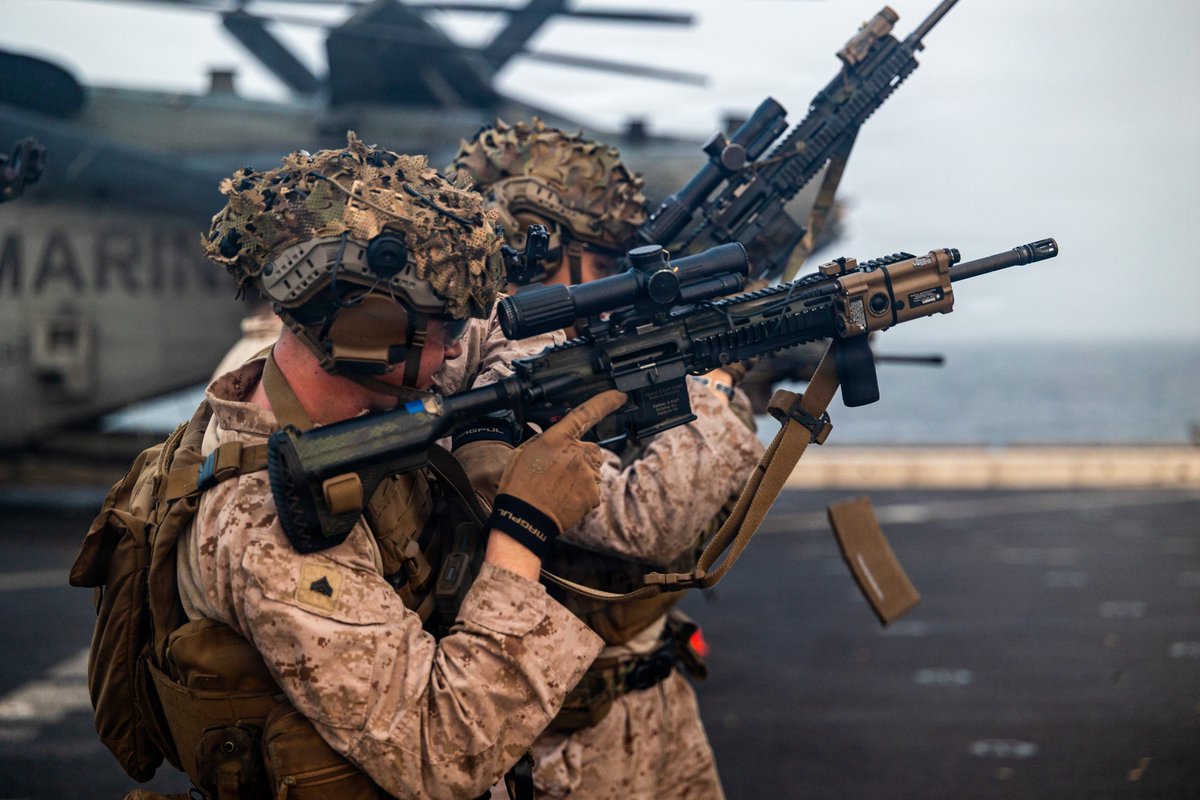 CENTCOM's tweet photo. U.S. Marines train on the flight deck of USS Portland (LPD 27) as the ship sails in the Arabian Sea. https://t.co/XnyyYnOb1r