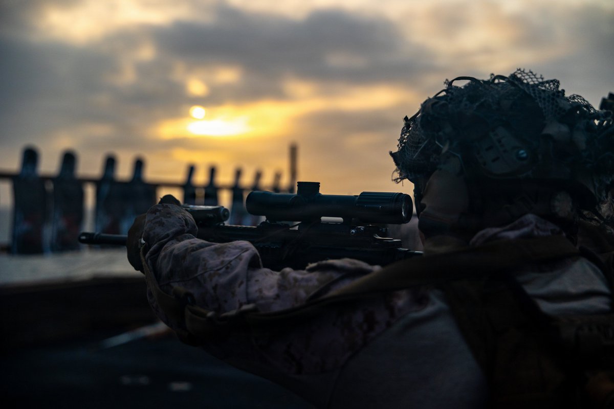 CENTCOM's tweet photo. U.S. Marines train on the flight deck of USS Portland (LPD 27) as the ship sails in the Arabian Sea. https://t.co/XnyyYnOb1r