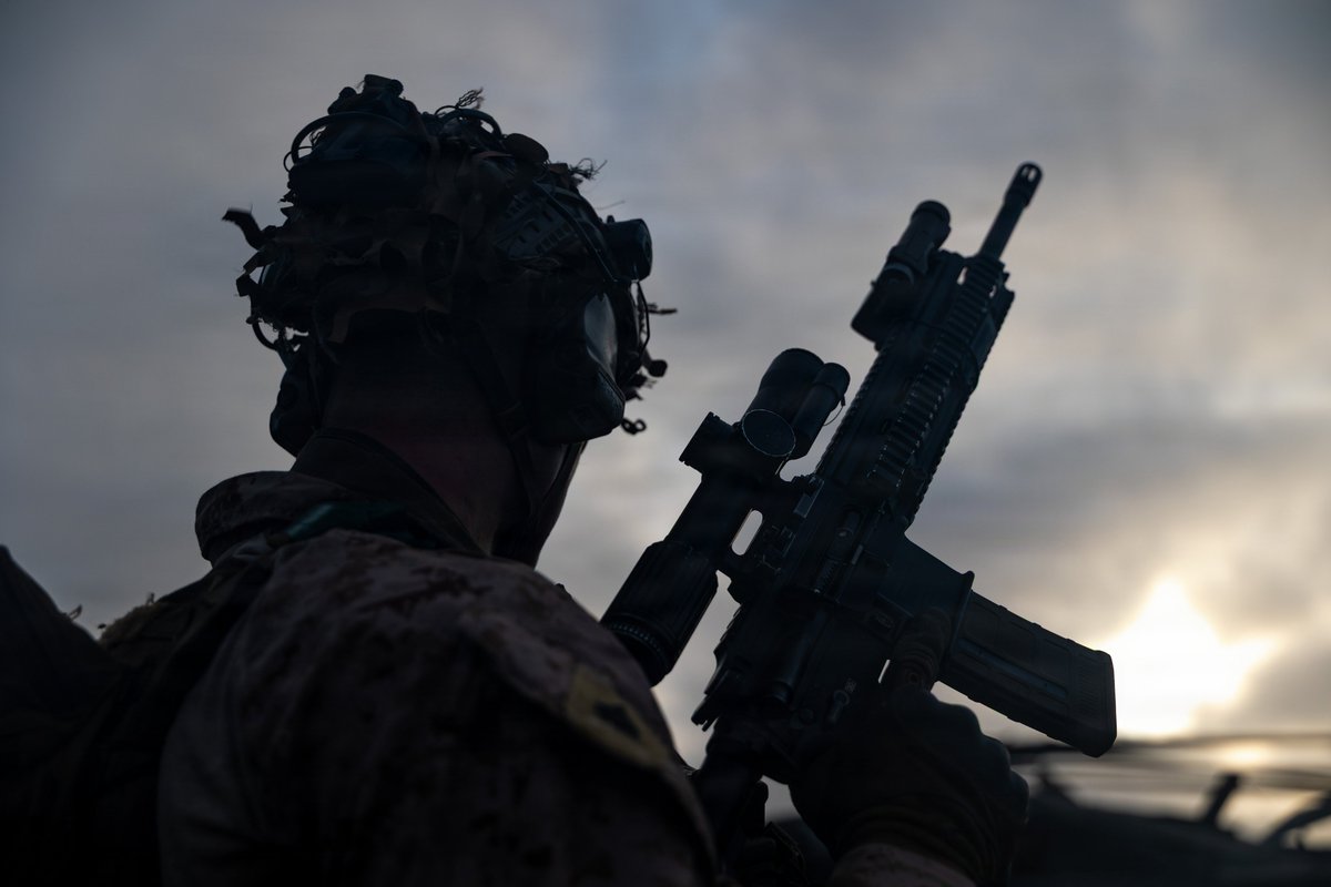 CENTCOM's tweet photo. U.S. Marines train on the flight deck of USS Portland (LPD 27) as the ship sails in the Arabian Sea. https://t.co/XnyyYnOb1r