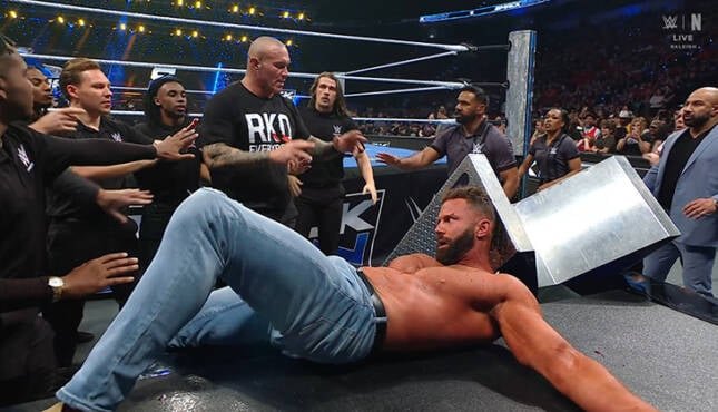 KaiStormPG's tweet photo. BRODY TOSSES REO INTO THE STEEL RING STEPS SENDING THEM SLIDING ACROSS THE FLOOR RINGSIDE!!

Brody Places The Lifeless Reo Back Inside The Ring... OH GOD... Brody Is Scaling The Turnbuckles... https://t.co/cKuEWiEOo5