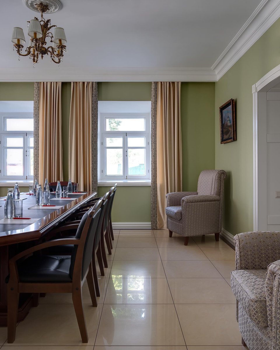 BelaHilton's tweet photo. From an old estate: a 2018 renovation of a small conference hall. Walls repainted, furniture reupholstered, new window textiles and decor. The floor, ceiling, and lighting remained unchanged due to budget and timing. A simple, affordable https://t.co/AhGe0C809D