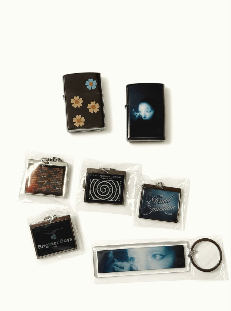 _positions__'s tweet photo. the eternal sunshine tour lighters and keychains https://t.co/U1n9qkqRBi