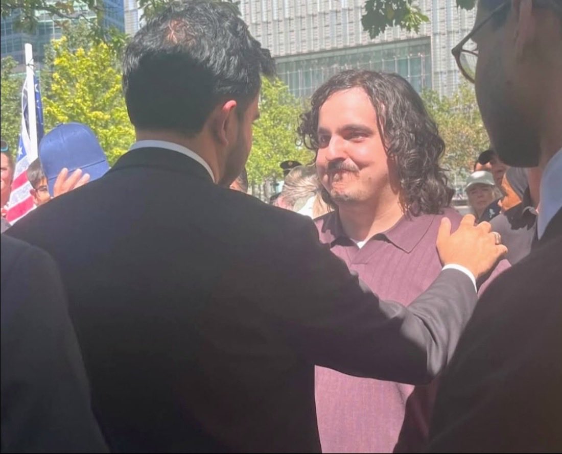 LauraLoomer's tweet photo. Oh…

So that’s why Mamdani ran over to him after his speech.

What does Mike Massaroli know about “honor” when he was fraternizing with @ZohranKMamdani at a 9/11 ceremony as the jihadist was laughing with joy at the names of the victims being read. 

Mamdani campaigned with Hasan Piker who said “America deserved 9/11”.