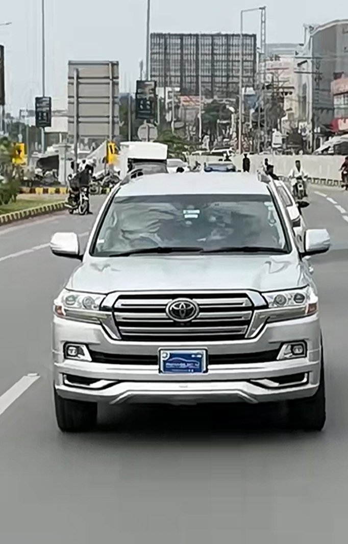 DaaStargoTora's tweet photo. Just came across a video featuring Mr. @suneelmunj and @ctplahore travelling together in a Land Cruiser, discussing traffic rules and people's behaviour.

The best part? They have a PakWheels sticker covering the number plates and are roaming around Lahore, which is illegal.

Quite ironic to lecture others on traffic rules while apparently violating them yourselves.