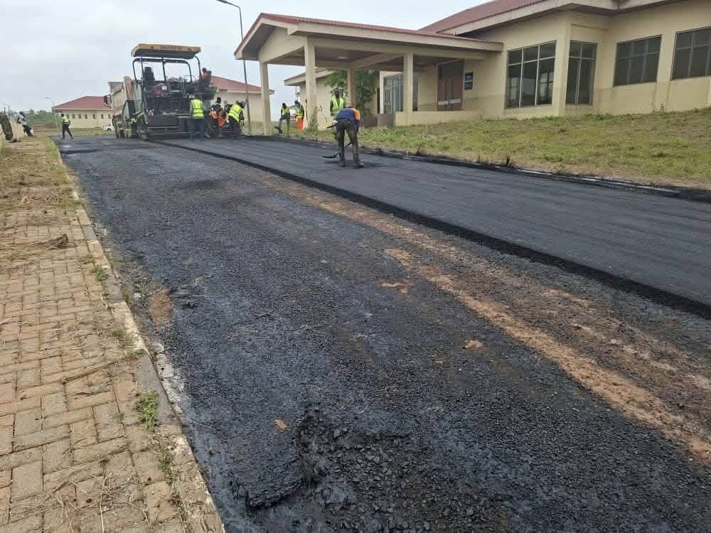 DrAmoakohene's tweet photo. We’re inside the hospital itself. Base works asphalt works ongoing. 
#BigPush #JM #Agbodza 
#KofiJob https://t.co/74NluCqYB7
