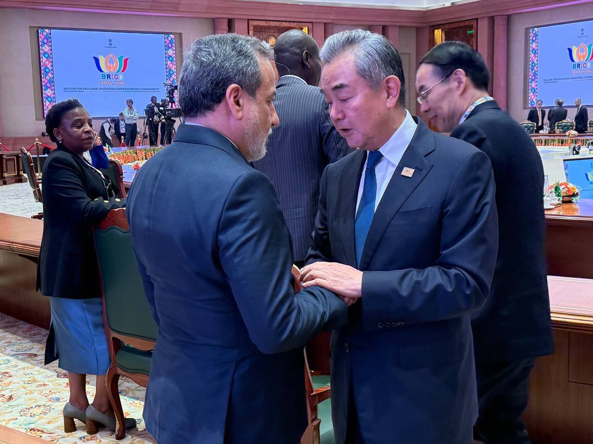 IrnaEnglish's tweet photo. Abbas Araghchi and Wang Yi, the Foreign Ministers of Iran and China, met and held talks on the sidelines of the BRICS Summit in New Delhi. https://t.co/OoyQUhSiPu