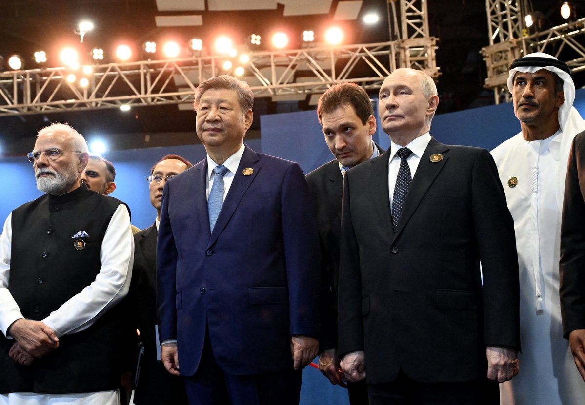 ANI's tweet photo. Prime Minister Narendra Modi with Chinese President Xi Jinping, Russian President Vladimir Putin, and other world leaders at the BRICS Summit in Delhi

(Source: Reuters) https://t.co/Z6yEEM0CfK